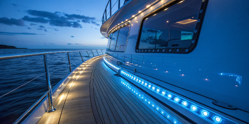 LED yacht lights Luxury yacht with LED lighting at dusk