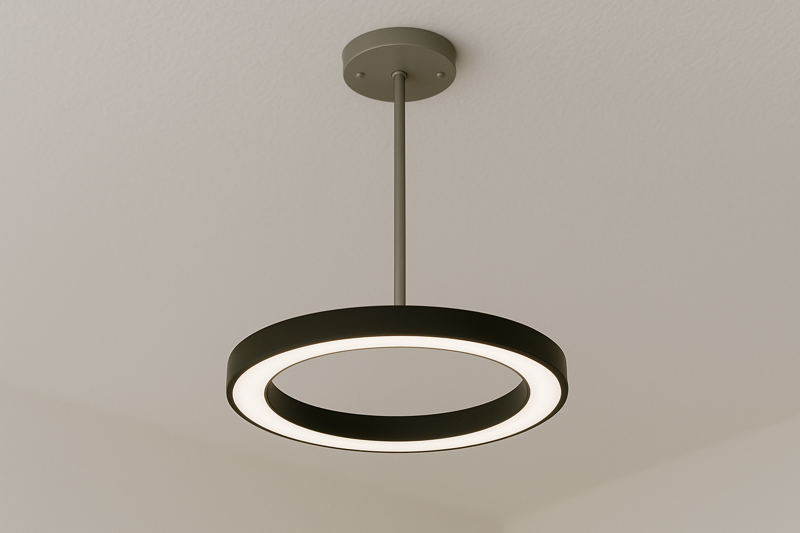 A modern, sleek integrated LED pendant light hanging from a ceiling