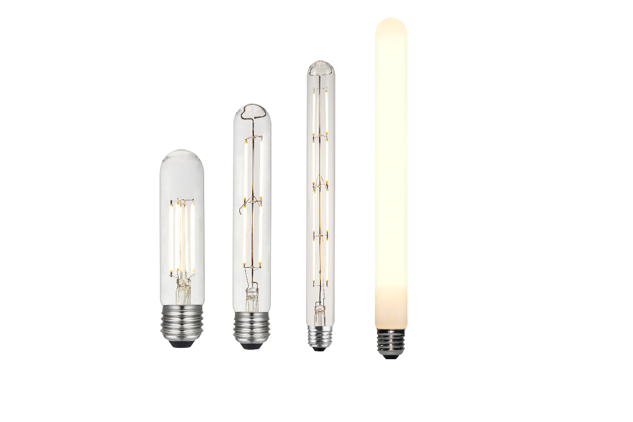 T-shaped LED filament bulbs in multiple lengths and finishes, including clear, linear filament, and matte glowing tube designs for decorative and architectural lighting