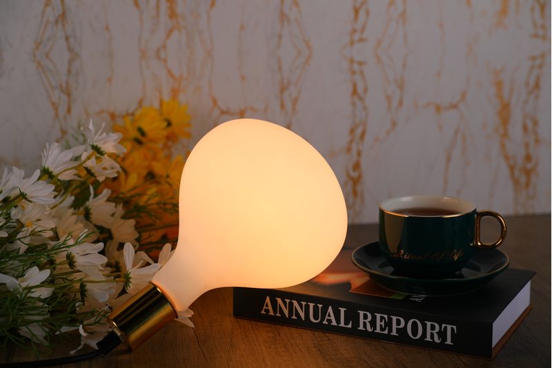 Matte white porcelain LED bulb used as a soft glowing object