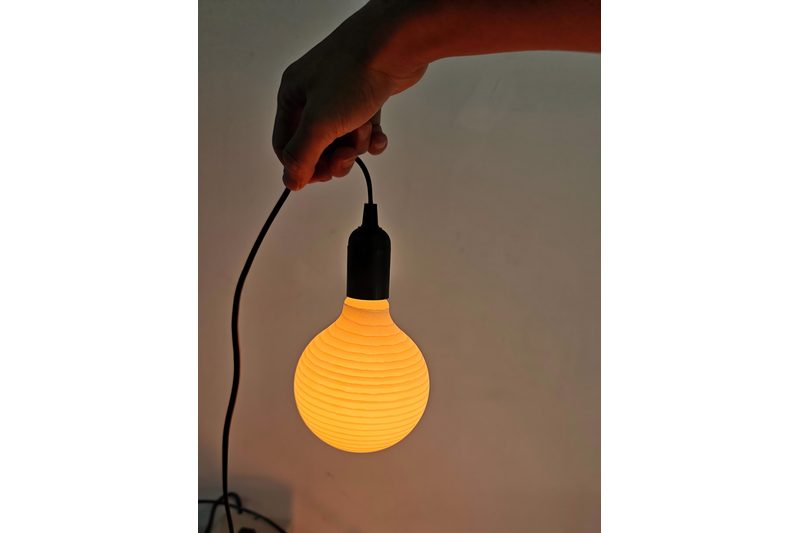 Printed alabaster bulb finish for soft decorative lighting
