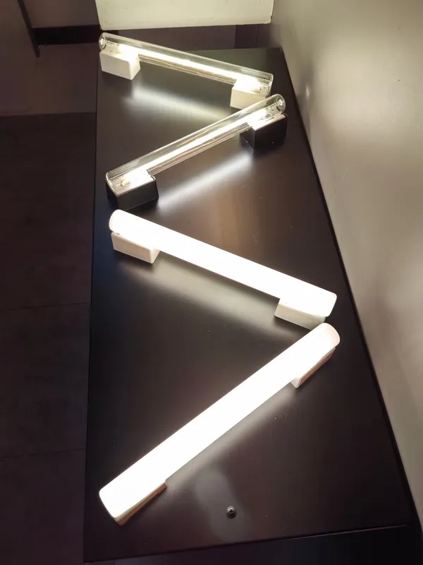 Porcelain S14d linear bulbs on a lighting display